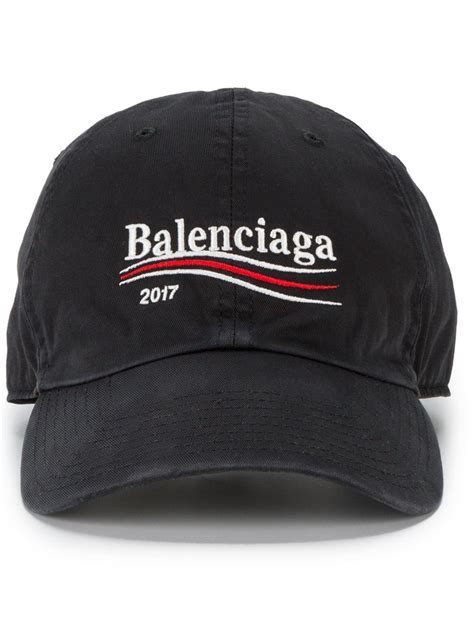 balenciaga bedecks hats.